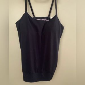 Under armour work out top. Size large . Built in bra , open back .